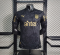 CAMISETA PEÑAROL NEGRA Y DORADA